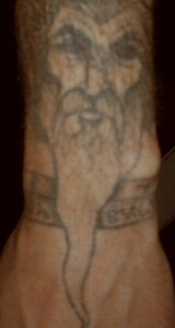 This wizard face is on my left forearm, I jokingly tell everyone that it is me at 65.