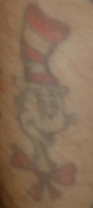 This is the cat and the hat which is located on my left forearm. I got it a number of years before the recent movie revived the cats popularity. It is dedicated to my second son James who was a big fan of Dr. Suess when he was a very young child.