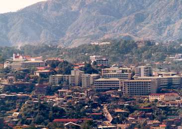 Education is very, very important to the Filipino family. Dorm is front - left center of white buildings,