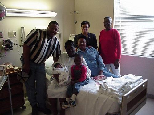 A Family Union: From left to right: Papaw Jones, Baby CJ, Mommy, Big Brother Jay, Bobbie, Mama V., and Grandma Johnson