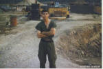 Back from the hospital at Cam Ron Bay with powderburn from explosion still in my left arm and hand.