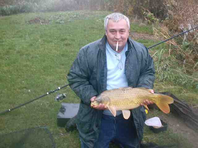 Kevin first Carp and current pb 14 pounds Earith
