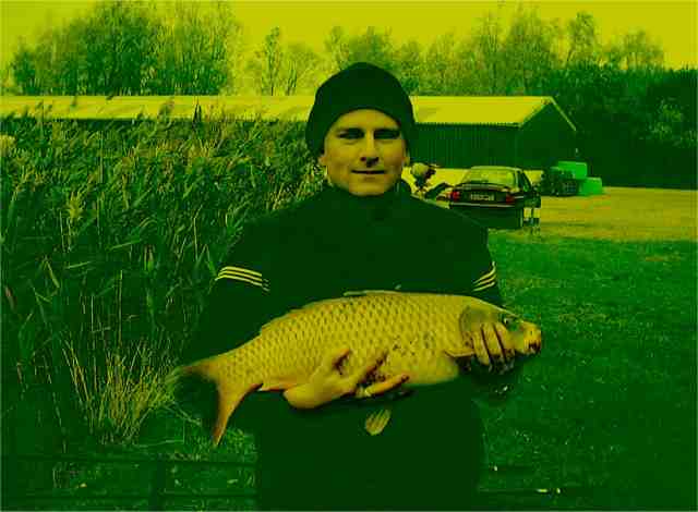 Kevin first Carp and current pb 14 pounds Earith