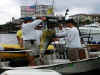 Weighing winning Dolphin on "The Sand Flea"