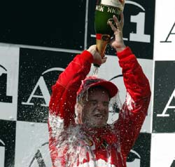 Barrichello with champagne 