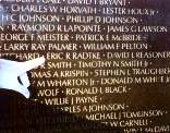 Flat Luke points to the name of Eric R. Radtke on the Vietnam War Memorial. CLICK FOR A LARGER VIEW