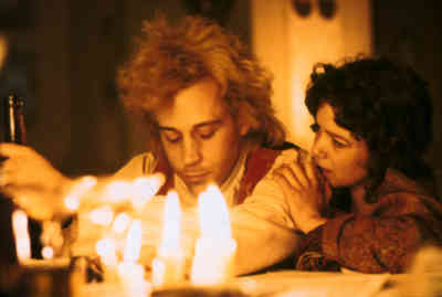 Constanze pleads with Mozart to stop working on "The Magic Flute" and finish the "Requiem".