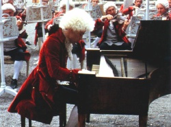 Tom Hulce giving an outdoor concert as the real Mozart often did.