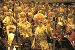 Hulce conducting "The Marriage of Figaro", while Jeffrey Jones (as Emperor Joseph) stifles a yawn in the background.
