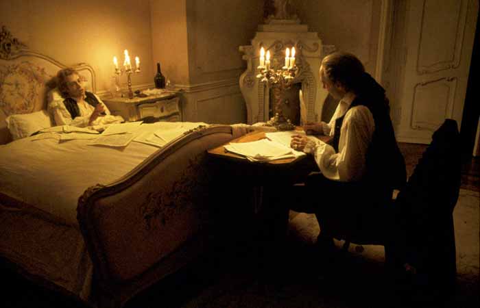 This scene from the film, in which a dying Mozart dictates the Requiem to Salieri was shot continuously with multiple cameras to give it a theatrical quality.
