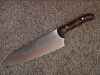Stunning chef's knife with marbled maple handle.