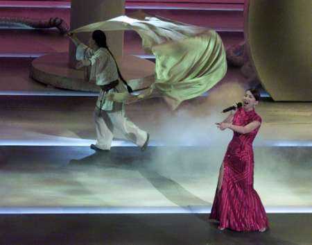 CoCo Lee on stage at the Oscars