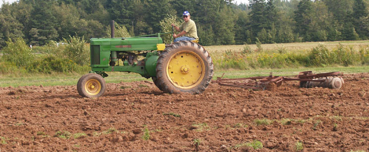 Harrowing with John Deere