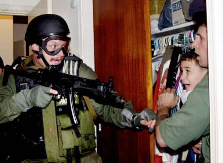 [INS Gunman capturing Dangerus Child]