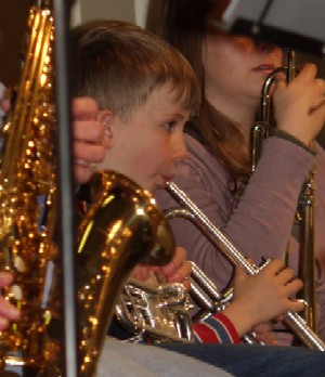 Young Forbes musicians play with the Sydney Youth Orchestra at the Forbes Town Hall, NSW, July 2005. Photo by Renee Orr, Forbes Advocate.