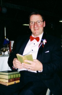 Mayor Alister Lockhart with books from the Wenz Collection, June 2004