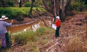 Australian landscape artist, Patrick Shirvington conducting a sketching class on Billabong Creek, Tichborne, NSW, 1 May 2005. Photo by Pamela Watson.