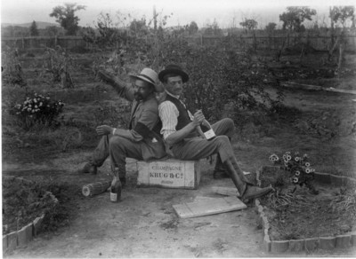 French-Australian writer and farmer, Paul Wenz and his early busines partner, William Dobson (left), celebrating the completion of Nanima homestead with a case of Krug champagne in the garden in 1898. 