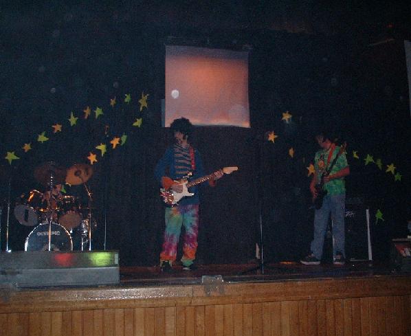 Here we are playing "Hey Joe." Michael Hughes (far&nbsp; left,) Michael Bridgewater (middle) and Daniel Peake (far right.)
