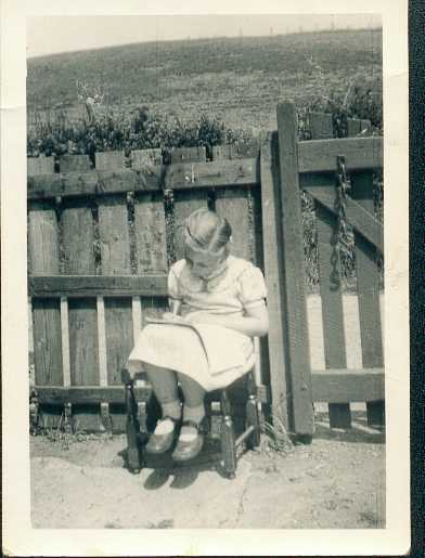 Me,  reading 'Jack & Jill' in the garden, very near to where the picture above was taken