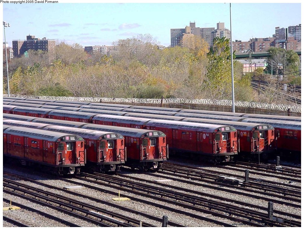 Redbirds in Corona Yard, with Flushing skyline in the background