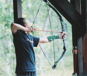 Picture of Scout ready with his Bow at Archery Range