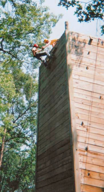 Picture of Scout getting ready to rappel down Climbing Tower