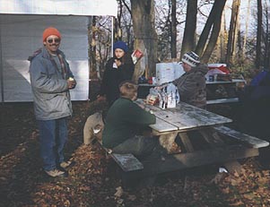 Image of Scouter with Guests in Eating Area