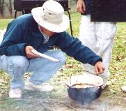 Image of Adult Leader Serving Lunch