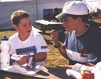Image of two scouts eating lunch