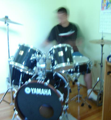 Derrick rockin faster than the camera can take his picture