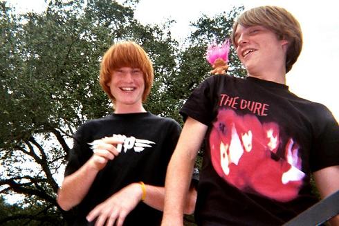 I'm diggin the The Cure shirt Justin has on, as well as the troll sittin on his shoulder.