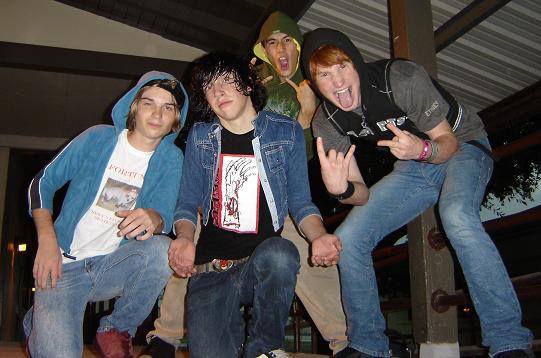 Justin, Tyler, Jason, and Pascal keepin warm with their new found jackets