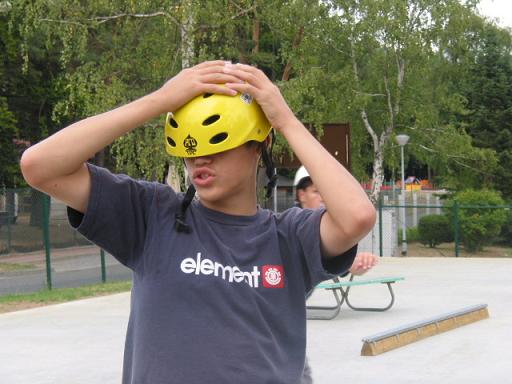 Ray shows us how your suposed to wear your helmut if you wanna DIE!!!