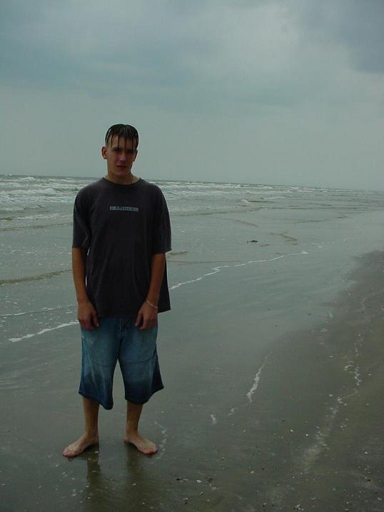 Will at the beach with his crazy du.