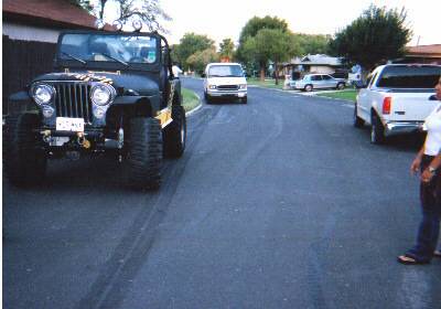 The Jeeps Bogger Skid mark started about 10 feet behind the White Van