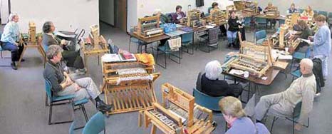 Members at monthly meeting