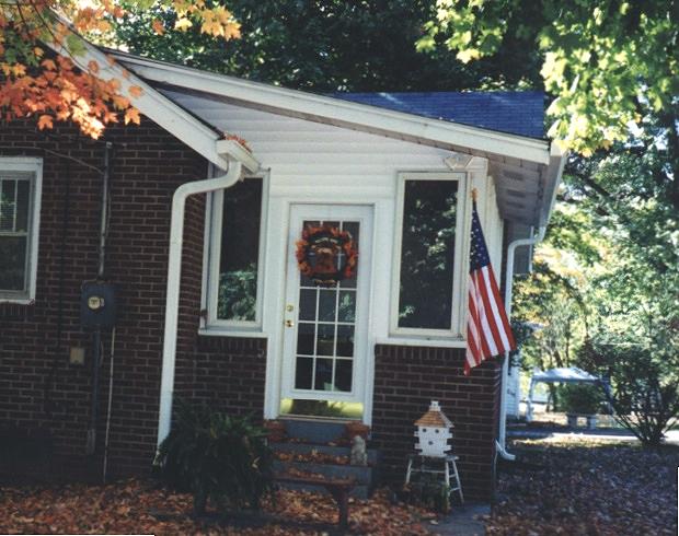 This charming back entrance is used by friends and family alike.