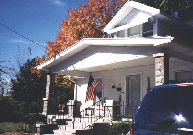 Next door is a beautiful home with another flag. (Looks like June and Ward may be home....)