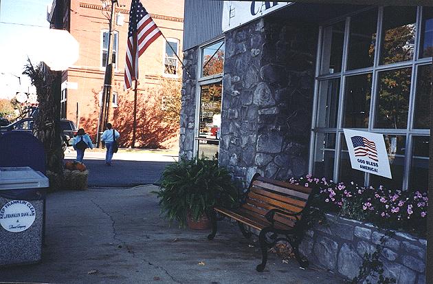 This cozy corner shows the Cafe as well as schoolgirls making their way to Moore's.