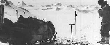 Gerald prepares the sledges for the descent.