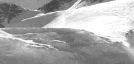 Icefalls flank the sledging route.
