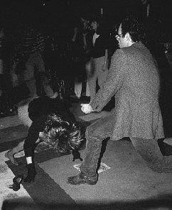 Fred getting down with a mystery chick, courtesy of www.Artrocity.com