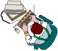 man typing at his desk