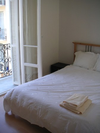 The bright and airy bedroom with its own balcony