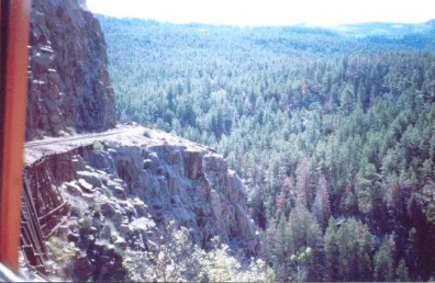 Railroad track along wall of canyon