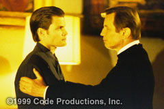 The movie's 'evil villian' engages in foreplay with the hero, his 'sex partner'