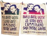 Sheets exposed in solidarity with Giovanni Falcone and Paolo Borsellino. They read: "You did not kill them: their ideas walk on our legs".