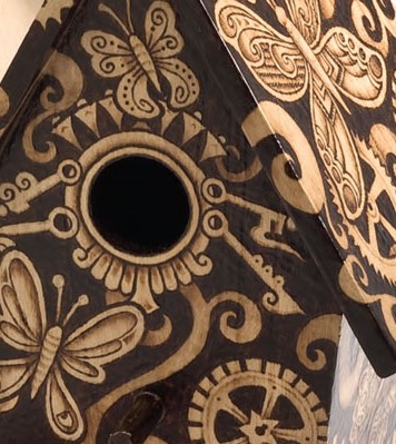 birdhouse with wood burning