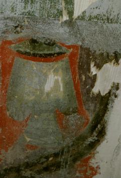 Painting on left corner
wall.